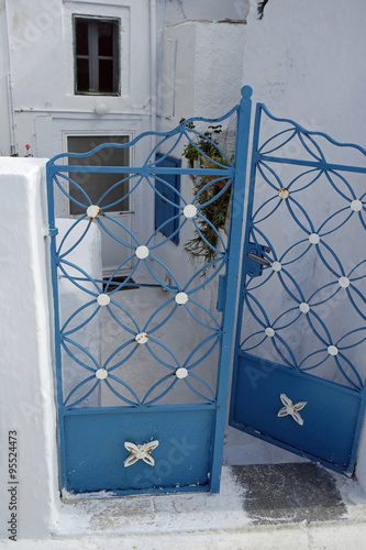 door in small greece village exo gonia on santorini photo