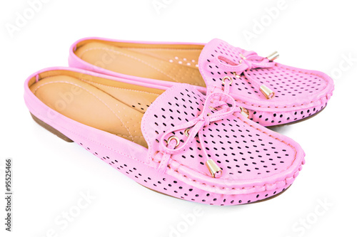 Women pink flats slip-on shoes with small ribbon , isolated on w