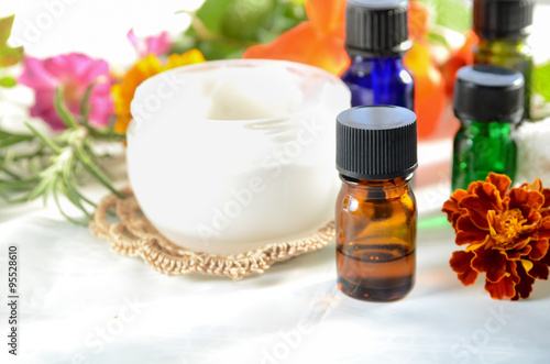 essential oils with cream for aromatherapy treatment