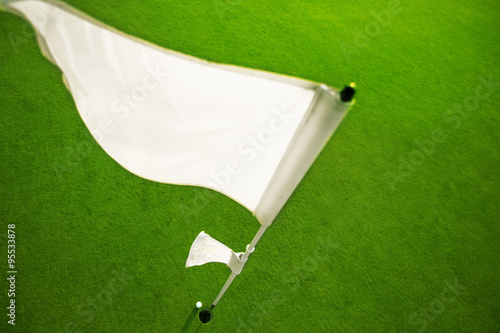 Golf course and flag on the golf court