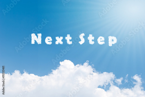 Blue sky background with next step clouds word photo