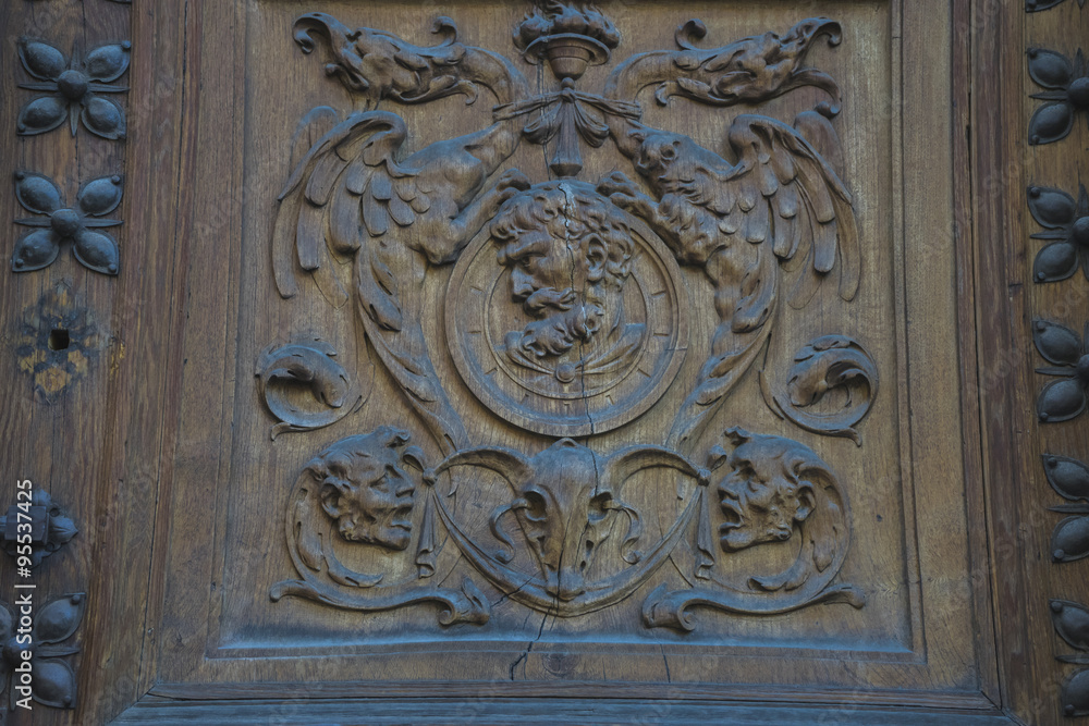 doorknob, old wooden door with carvings