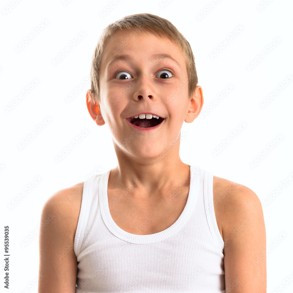 Portrait of a happy cute boy on a light background. Portrait of a happy cute boy on a light background.