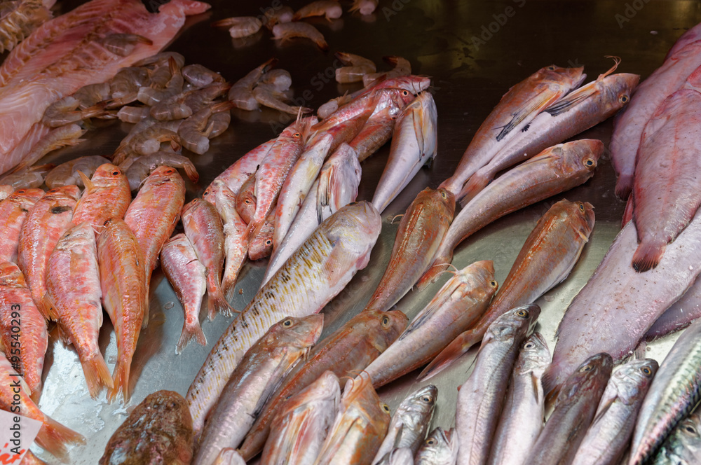 Fresh fish of Mediterranean cooking on the shelves Fresh fish of Mediterranean cooking on the shelves