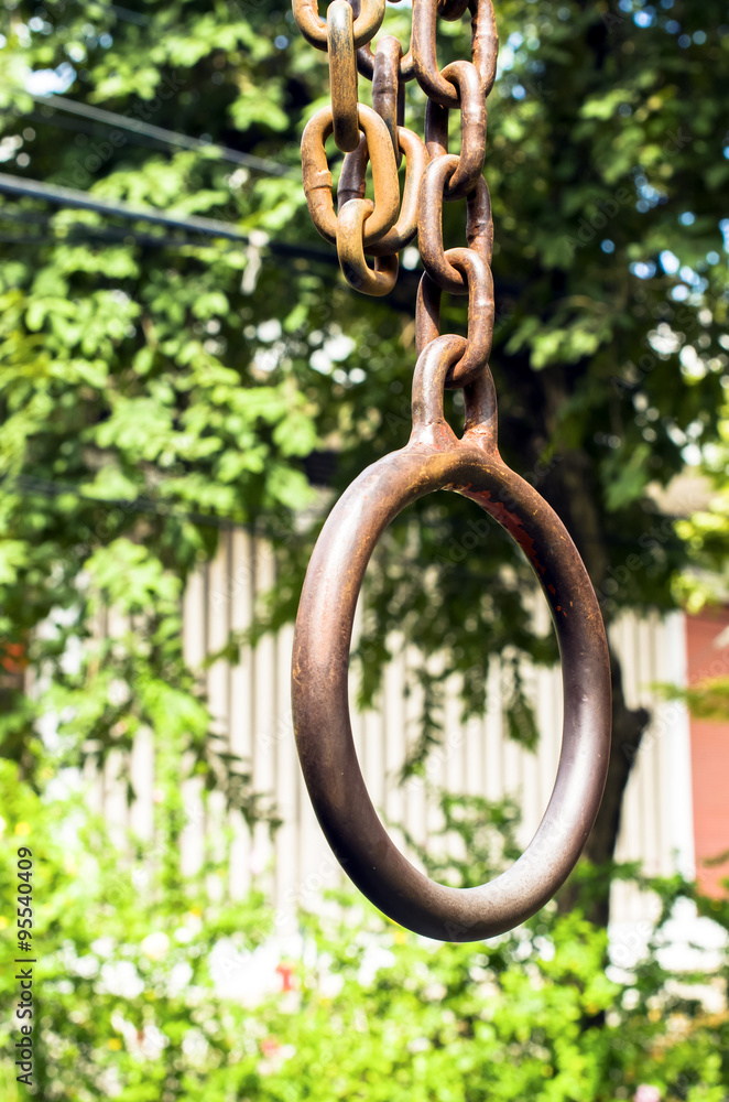 Rusty circle chain on the background blurred, Close up and selective focus Rusty circle chain on the background blurred, Close up and selective focus
