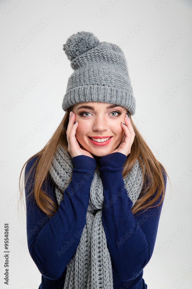 Smiling woman in winter cloth looking at camera Smiling woman in winter cloth looking at camera