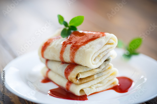 sweet pancakes with strawberry jam