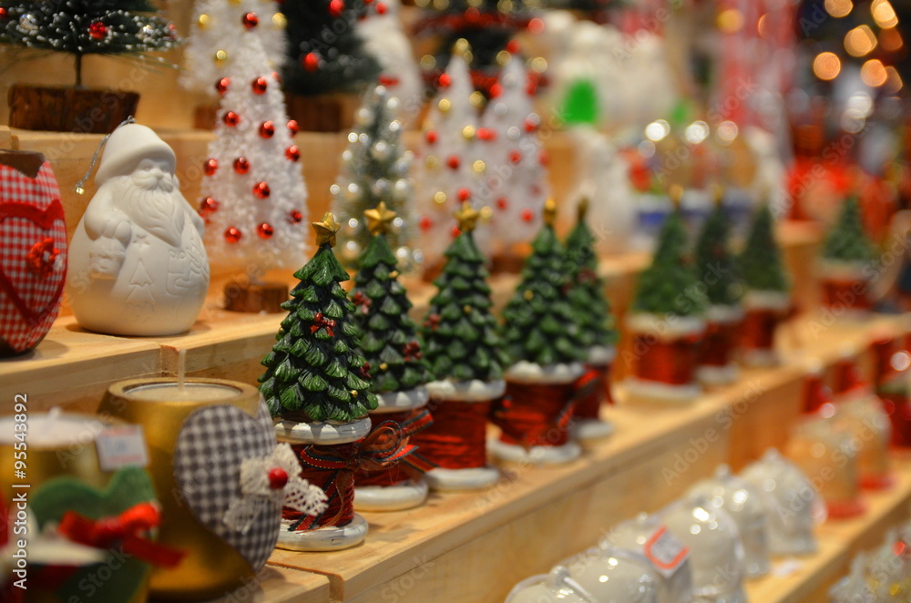 Christmas trees, snowman and candle for sale