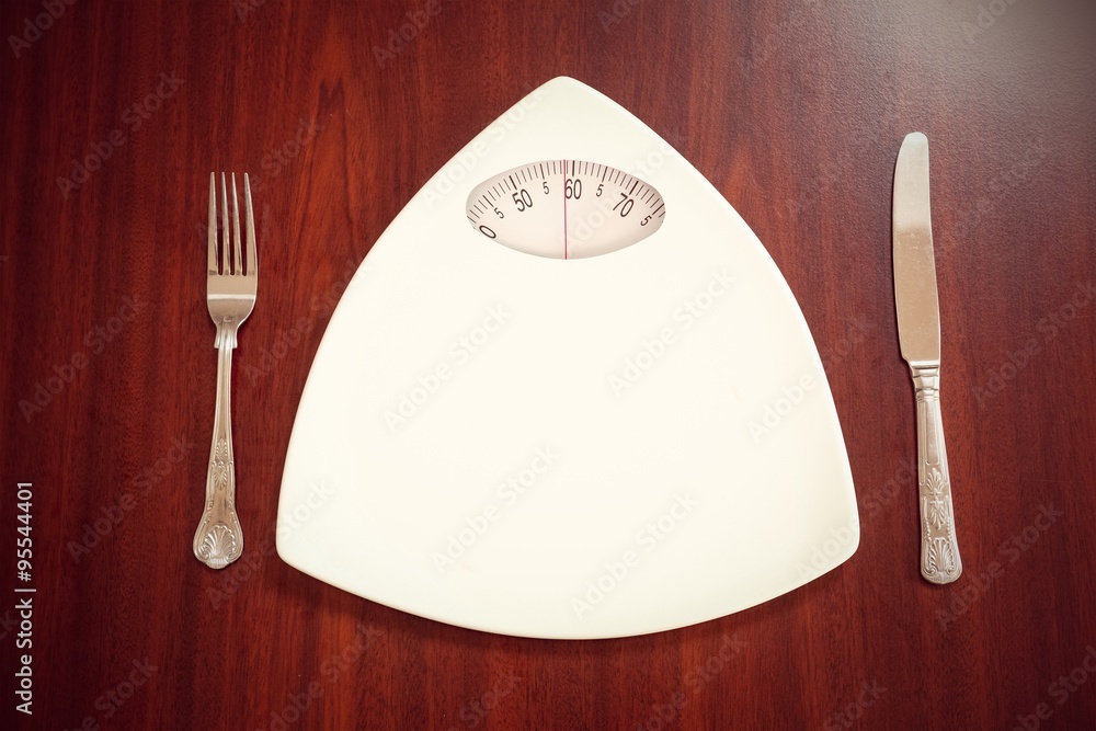 Composite image of weighing scale Composite image of weighing scale