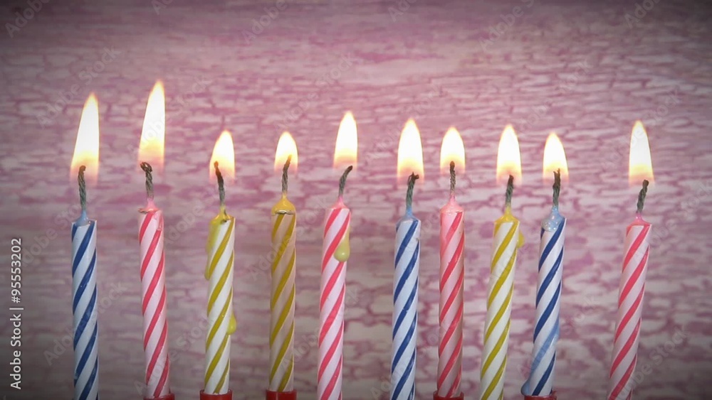 Birthday candles burning. blowing out candles Birthday candles burning. blowing out candles