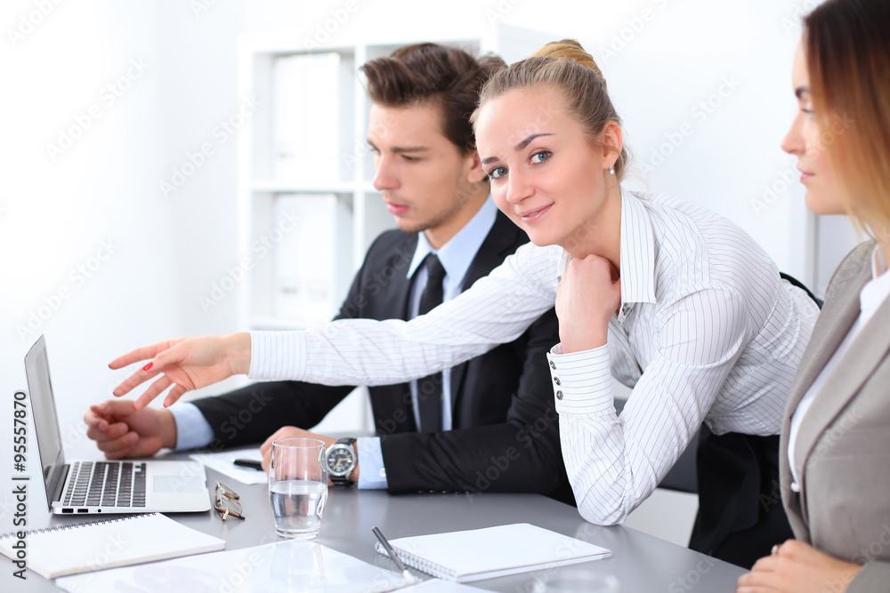 Group of Business people at meeting, focus on blond business woman Group of Business people at meeting, focus on blond business woman