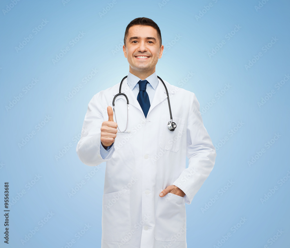 smiling doctor in white coat showing thumbs up smiling doctor in white coat showing thumbs up