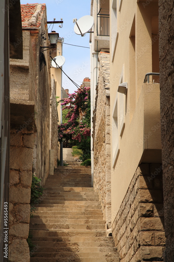 Fototapeta premium Igrane narrow alley with stairs