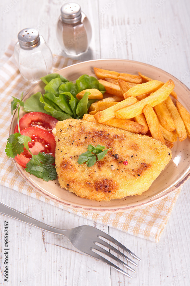 plate with cordon bleu and french fries