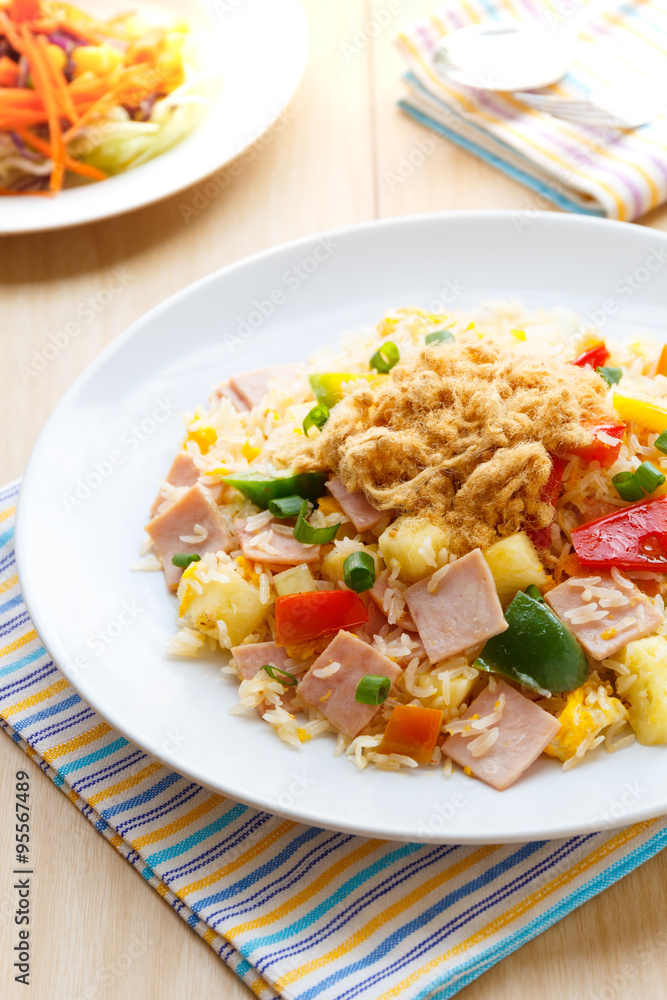 Thai food fried rice with ham, and pineapple. Thai food fried rice with ham, and pineapple.