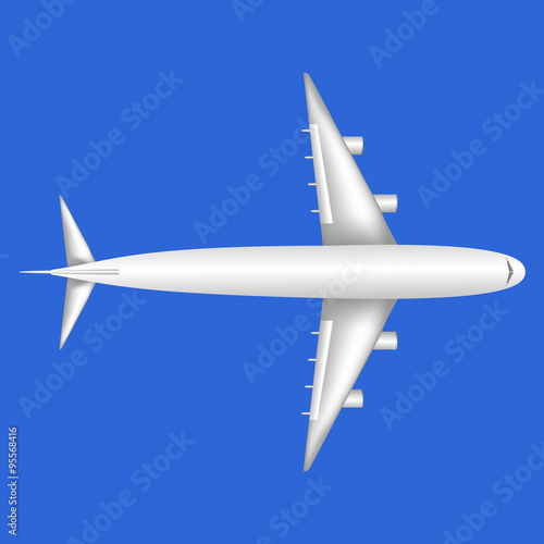Overview of a large white jumbo jet airliner airplane on a blue sky background.