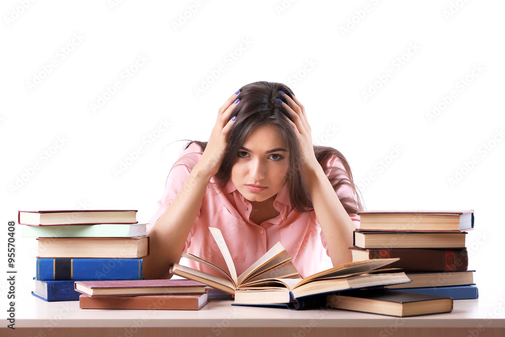 Young girl with books isolated on white Young girl with books isolated on white