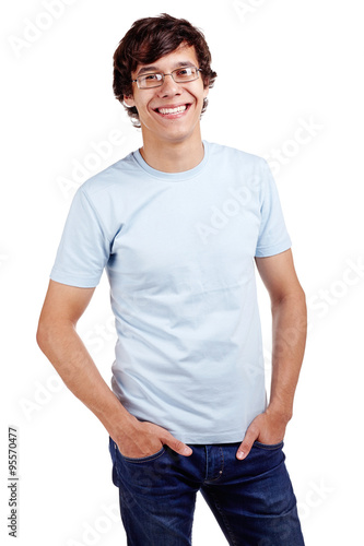 Smiling guy with hands in pockets