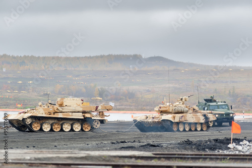 Armoured recovery vehicle BREM-1M evacuates tank