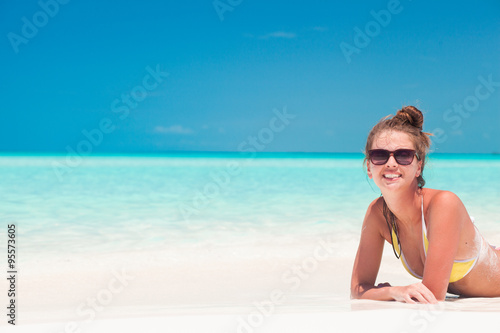 long haired girl in having fun on tropical barbados beach 
