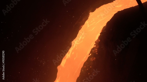 jet of liquid metal slow motion closeup