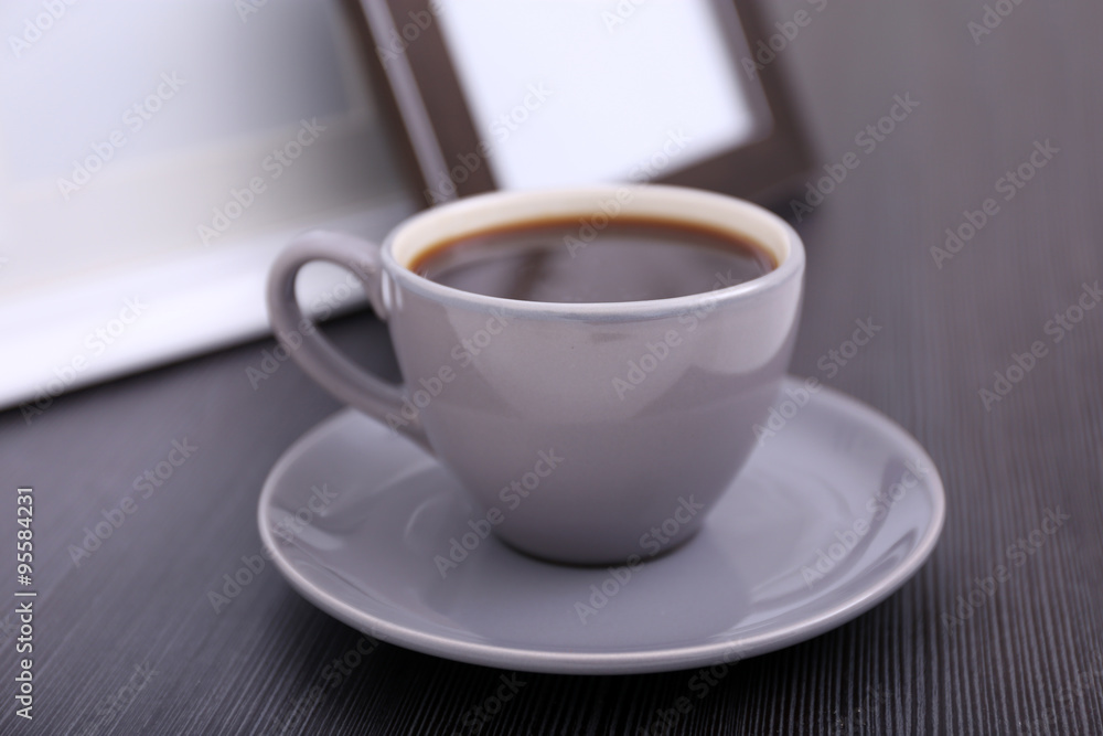 Cup of coffee on commode in room Cup of coffee on commode in room
