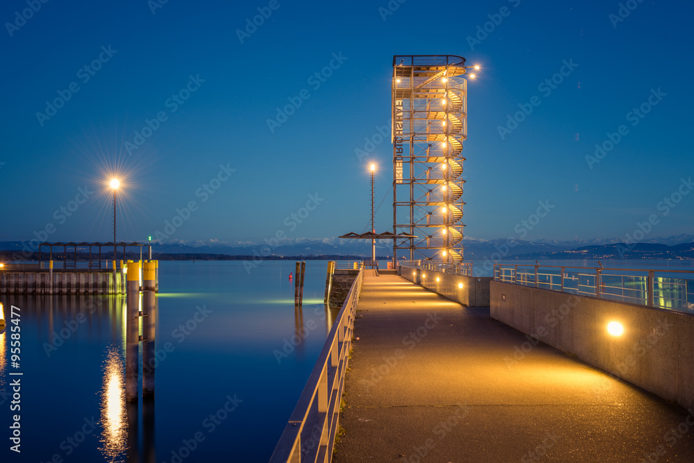 Naklejka premium Pier with Sightseeing Tower situated at the Harbor in Friedrichshafen - lake constance. High Dynamic Range Picture.
