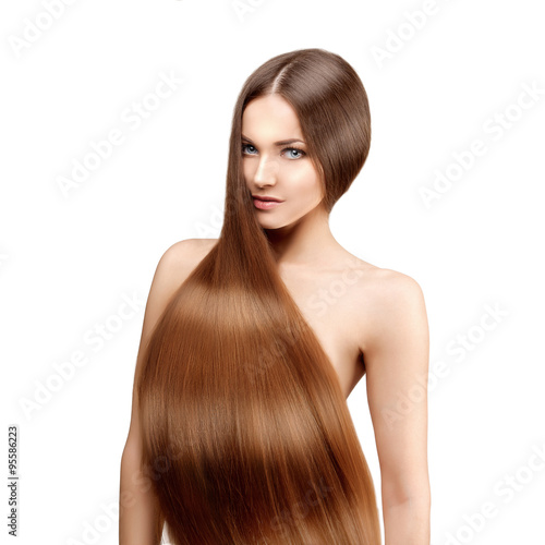 Long hair. Hairstyle. Hair Salon. Fashion model with shiny hair.