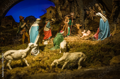 Bild auf Leinwand Christmas Manger scene with figurines including Jesus, Mary, Jos