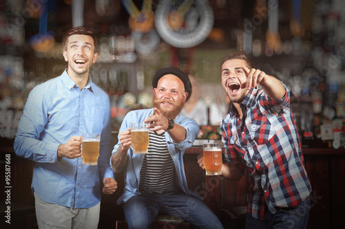 Young men with beer rejoice...
