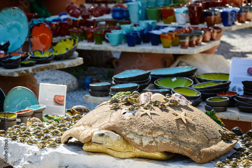 Sculpture of turtle at souvenir shop on Crete island photo