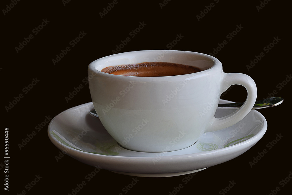 Hot espresso brewed in a glass in the morning with isolate black background . Hot espresso brewed in a glass in the morning with isolate black background .