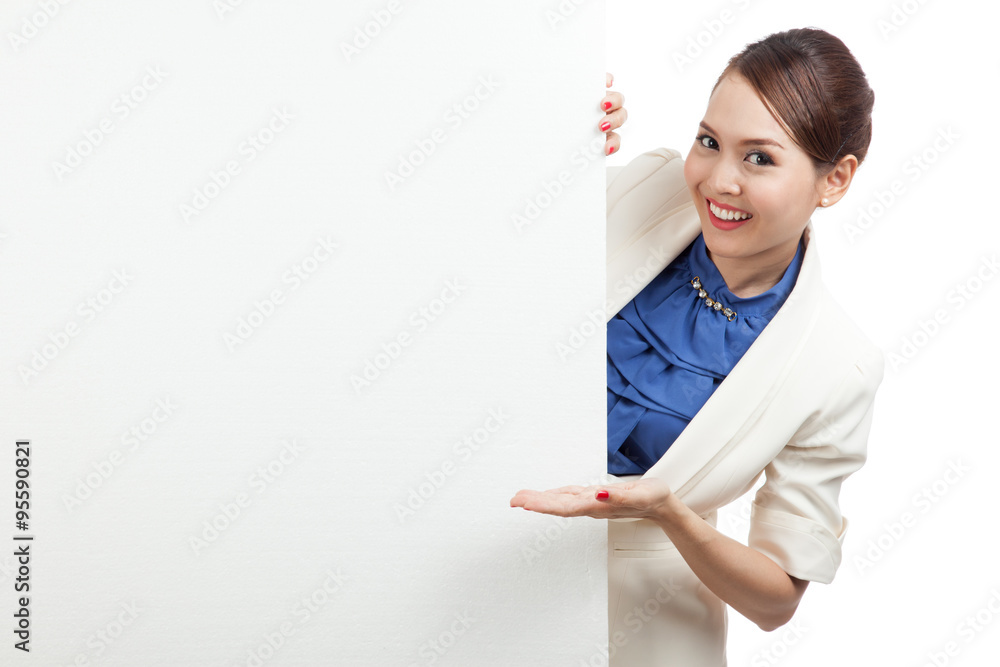 Young Asian woman present blank sign with palm hand Young Asian woman present blank sign with palm hand