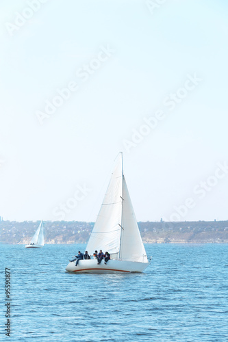 Sailing yacht on river