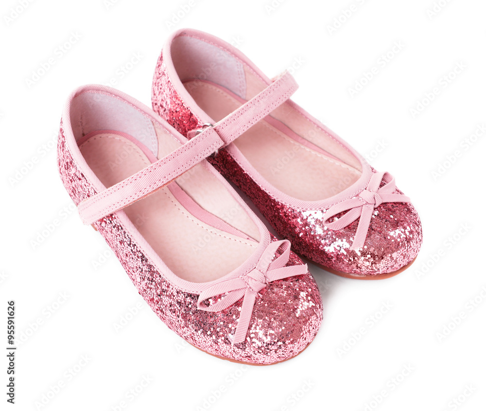 Obraz premium Shiny pink girls shoes isolated on white background