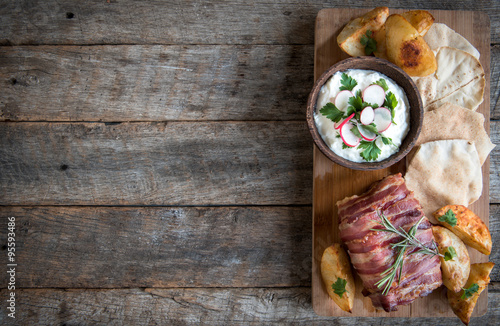 Served rolled meat and potatoes