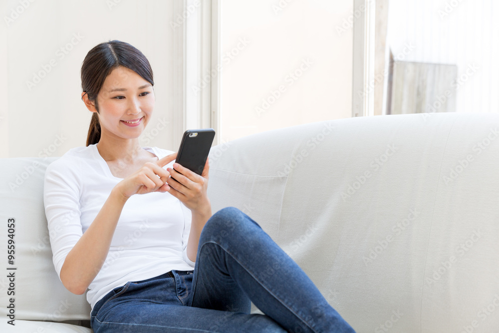 young asian woman using smart phone young asian woman using smart phone