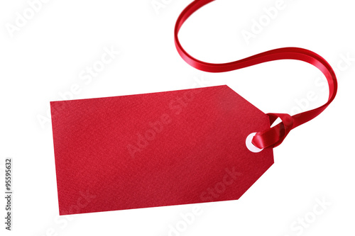 Blank red gift tag with curly ribbon isolated on white background