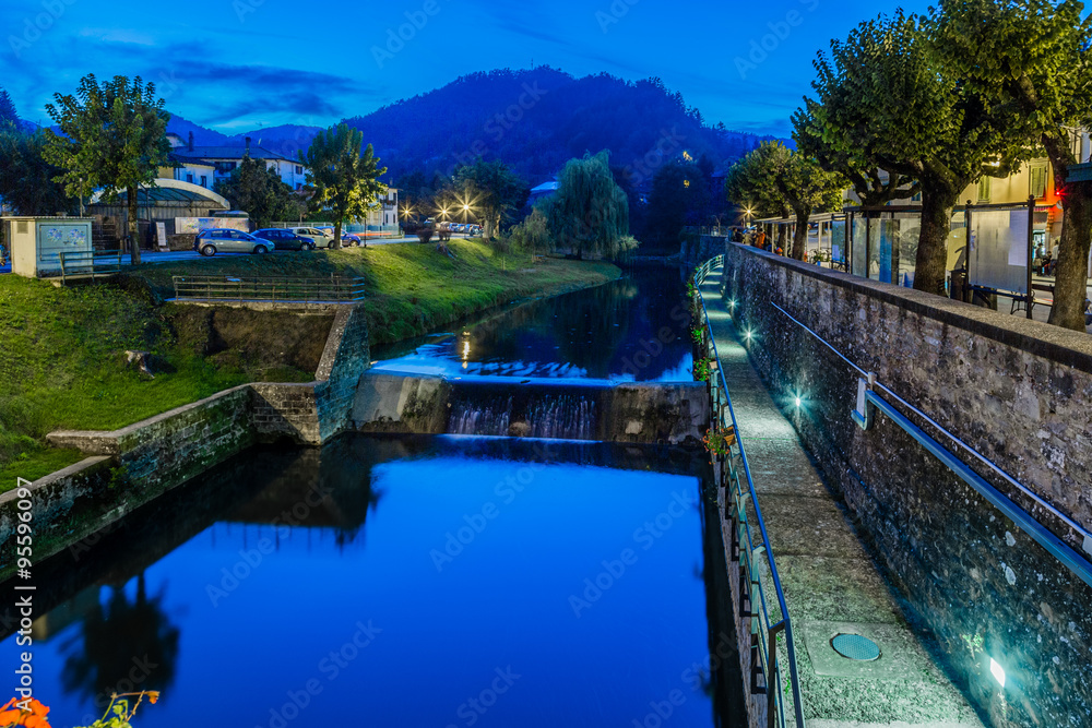 river through mountain village in Tuscany river through mountain village in Tuscany