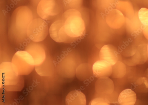 Festive gold background with bokeh effect © Светлана Ильева
