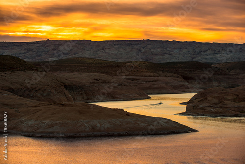 Boat at Sunset Lake Powell photo