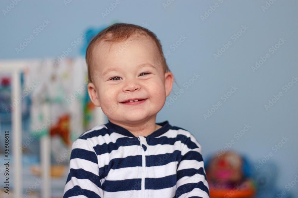 beautiful little boy in a striped suit beautiful little boy in a striped suit