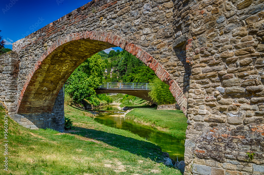 Fototapeta premium three archs medieval bridge in Italy