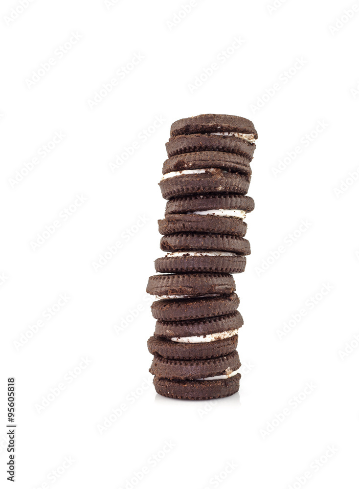 Chocolate cookies with cream filling tower isolated on white bac Chocolate cookies with cream filling tower isolated on white bac