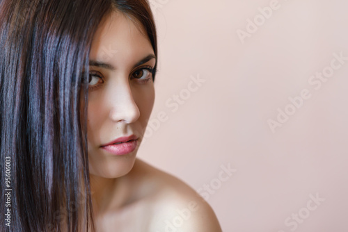 Portrait of a beautiful young woman. Shallow depth of field. Selective focus on the lips.