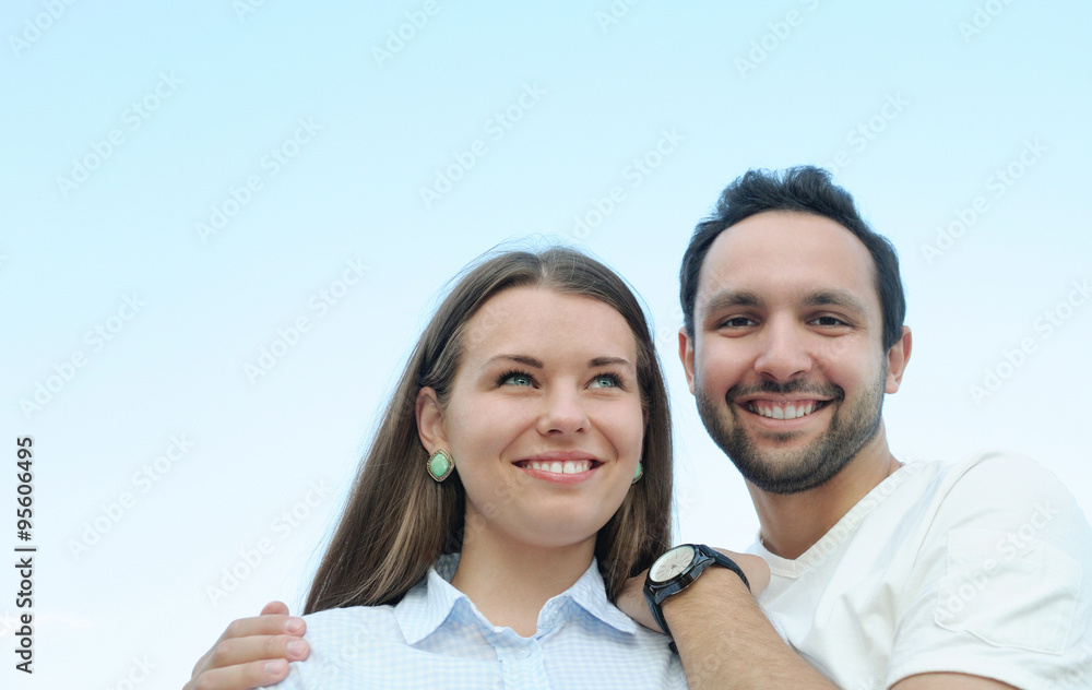 happy young couple outdoors in summer sunny day happy young couple outdoors in summer sunny day