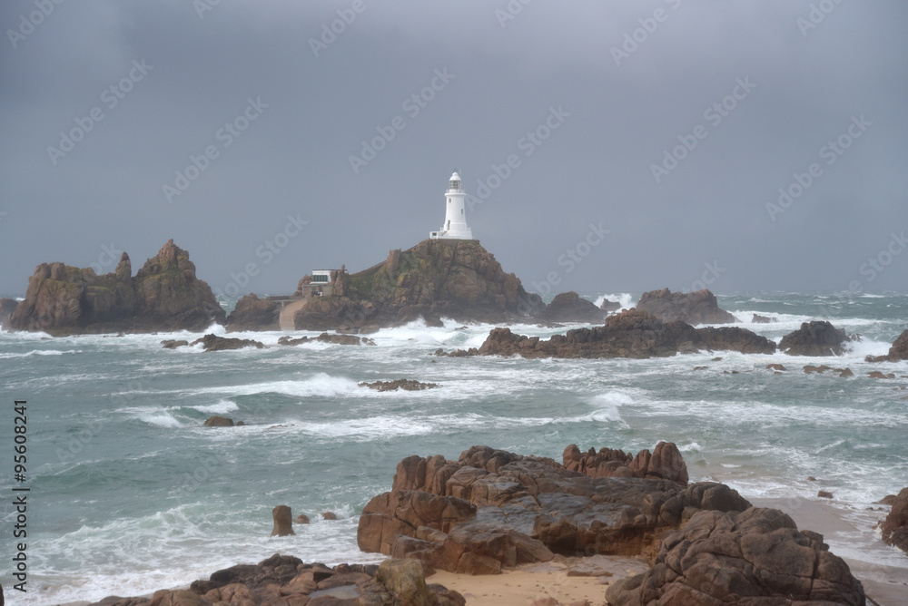 Corbiere lighthouse in storm on Jersey