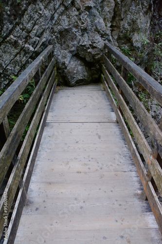 Wooden pier and rock