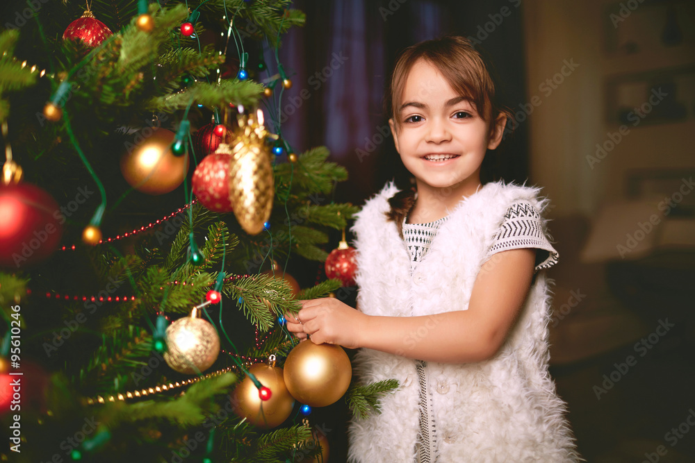 Girl by Christmas tree Girl by Christmas tree
