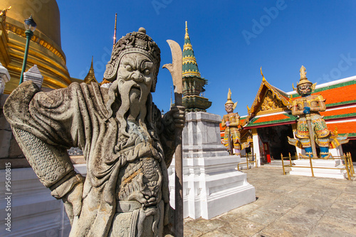 Close up chinese doll at Wat Phra Kaew Ancient temple in bangkok Thailand photo